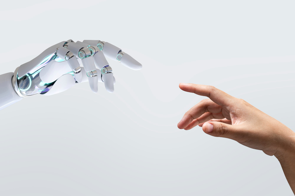 Representação da IA (representada por uma mão robótica) cumprimentando uma mão humana simbolizando a integração entre tecnologia e a criatividade humana.